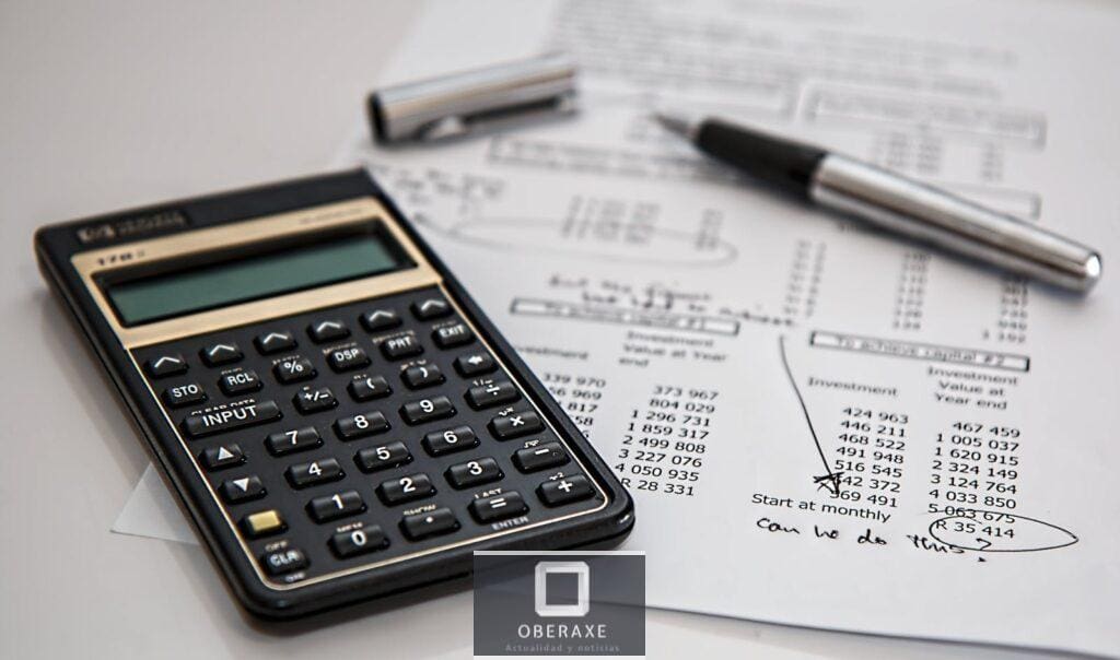Close-up of financial documents with calculator and pen, ideal for business management themes.